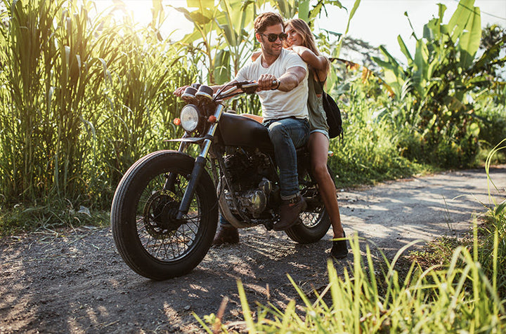 Two people riding motorcycle 
