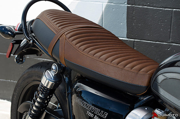 Custom brown seat cover on black motorcycle 