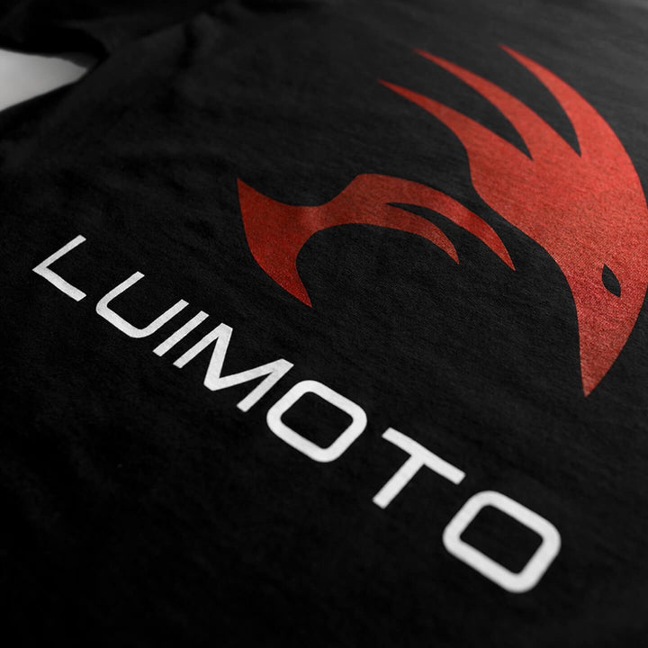 Luimoto red and white logo on a black t-shirt